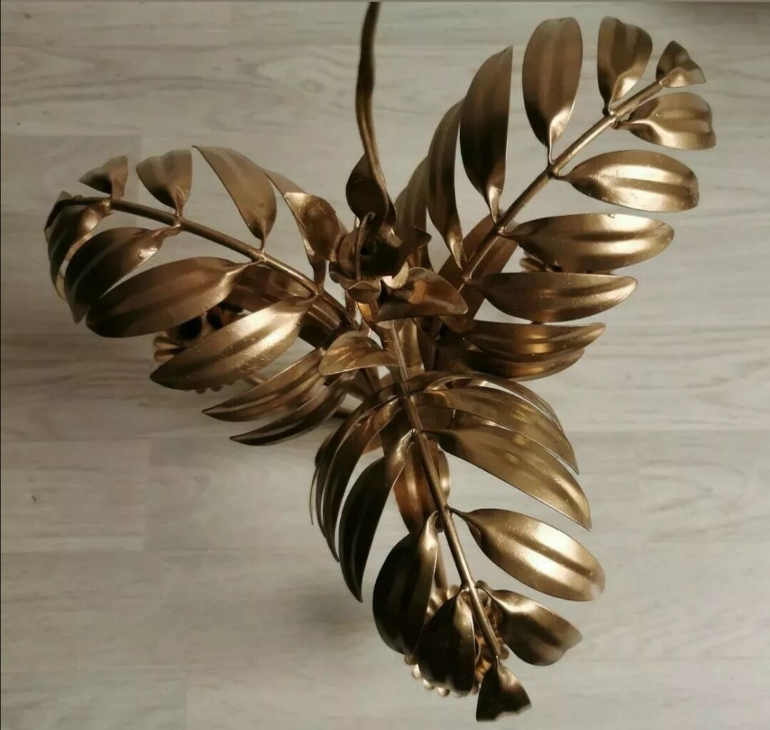 Golden metal palm lamp