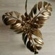 Golden metal palm lamp