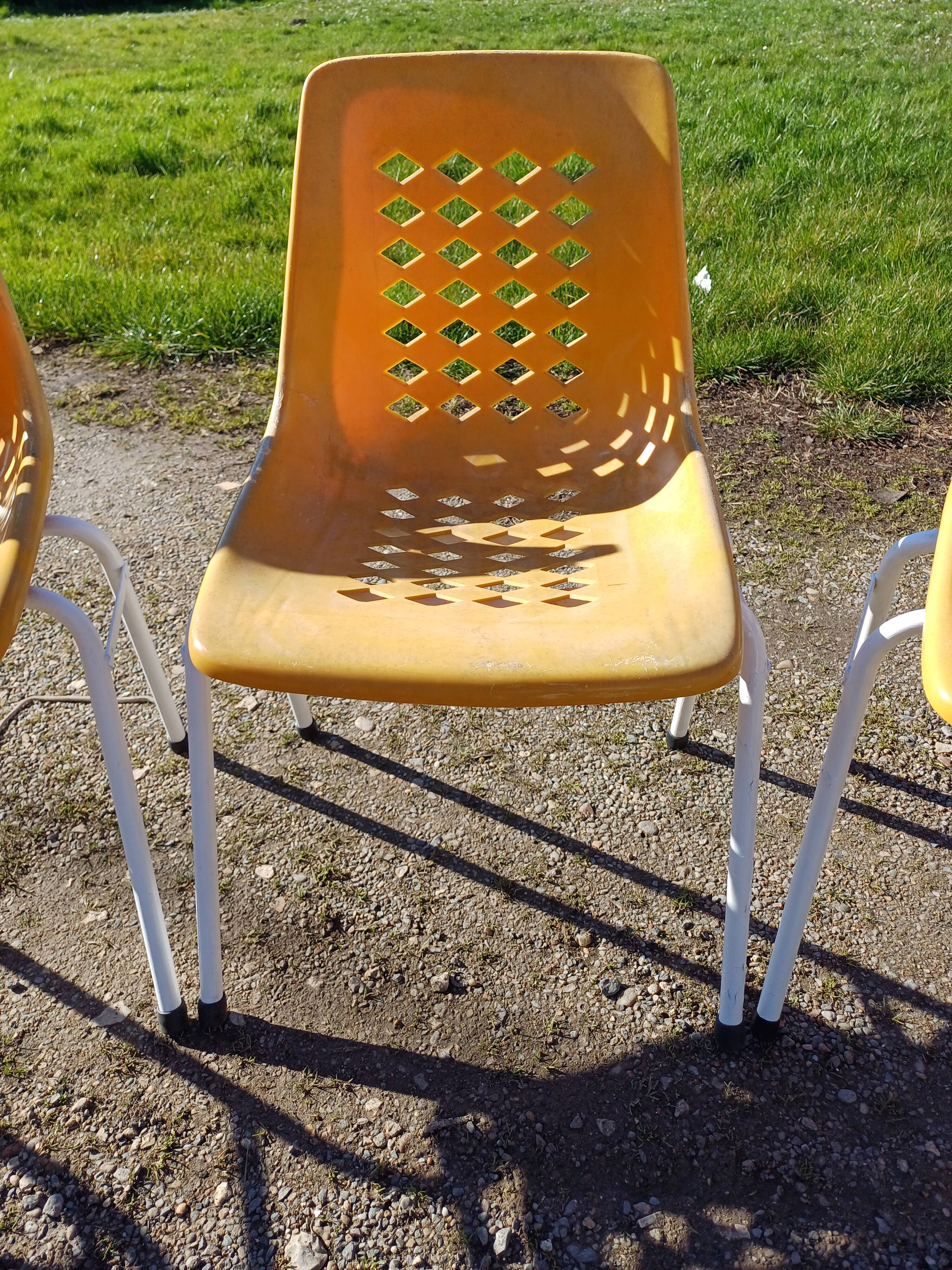 6 vintage iron and orange plastic garden chairs