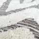 Large hand-knotted beige and cream Berber rug, 2.90m x 1.80m.