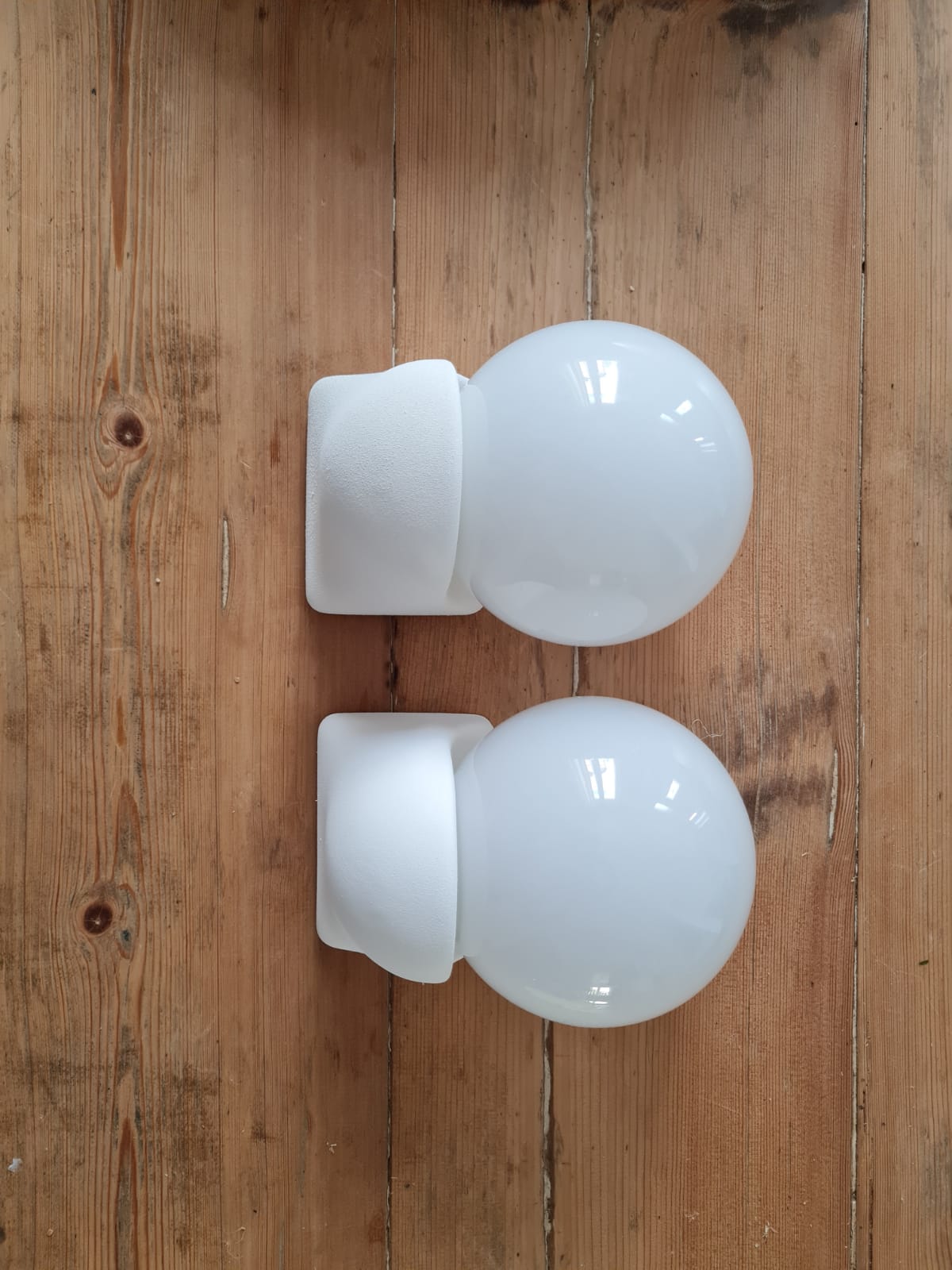 Pair of white opaline wall lamps