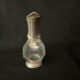 Glass decanter and silver metal duck