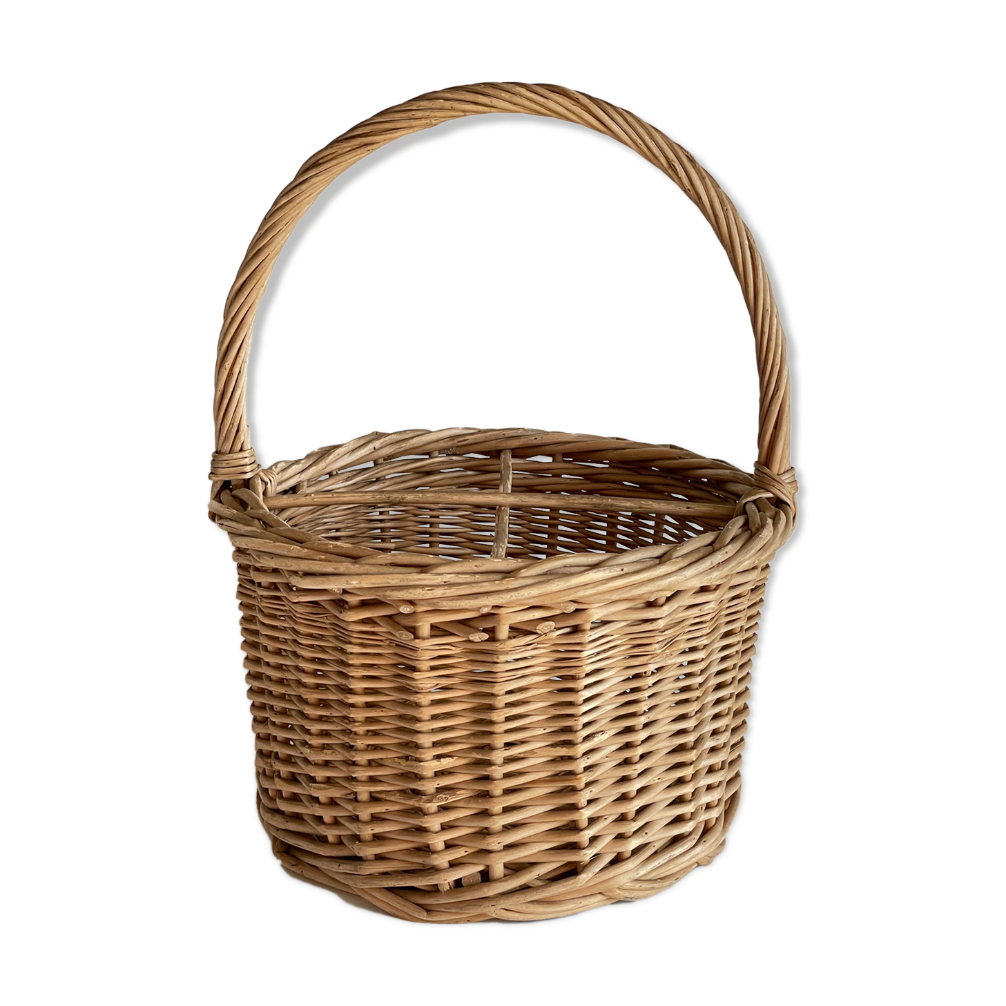 Basket with vintage rattan bottles