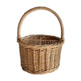 Basket with vintage rattan bottles