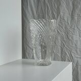 Glass vase with stylized flower pattern