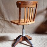 Height-adjustable rotating workshop office chair