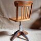 Height-adjustable rotating workshop office chair