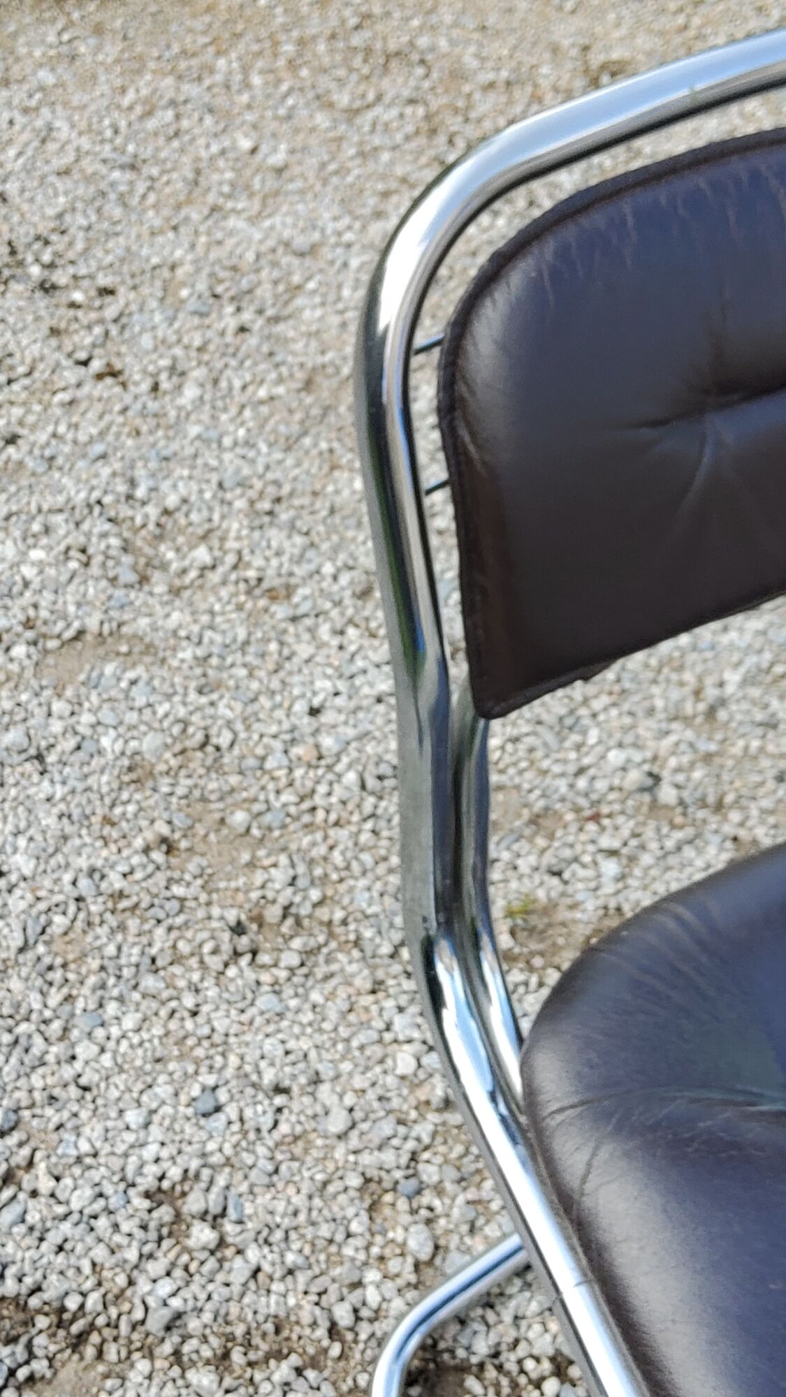 Chair from the 70s in chromed metal and brown moleskine