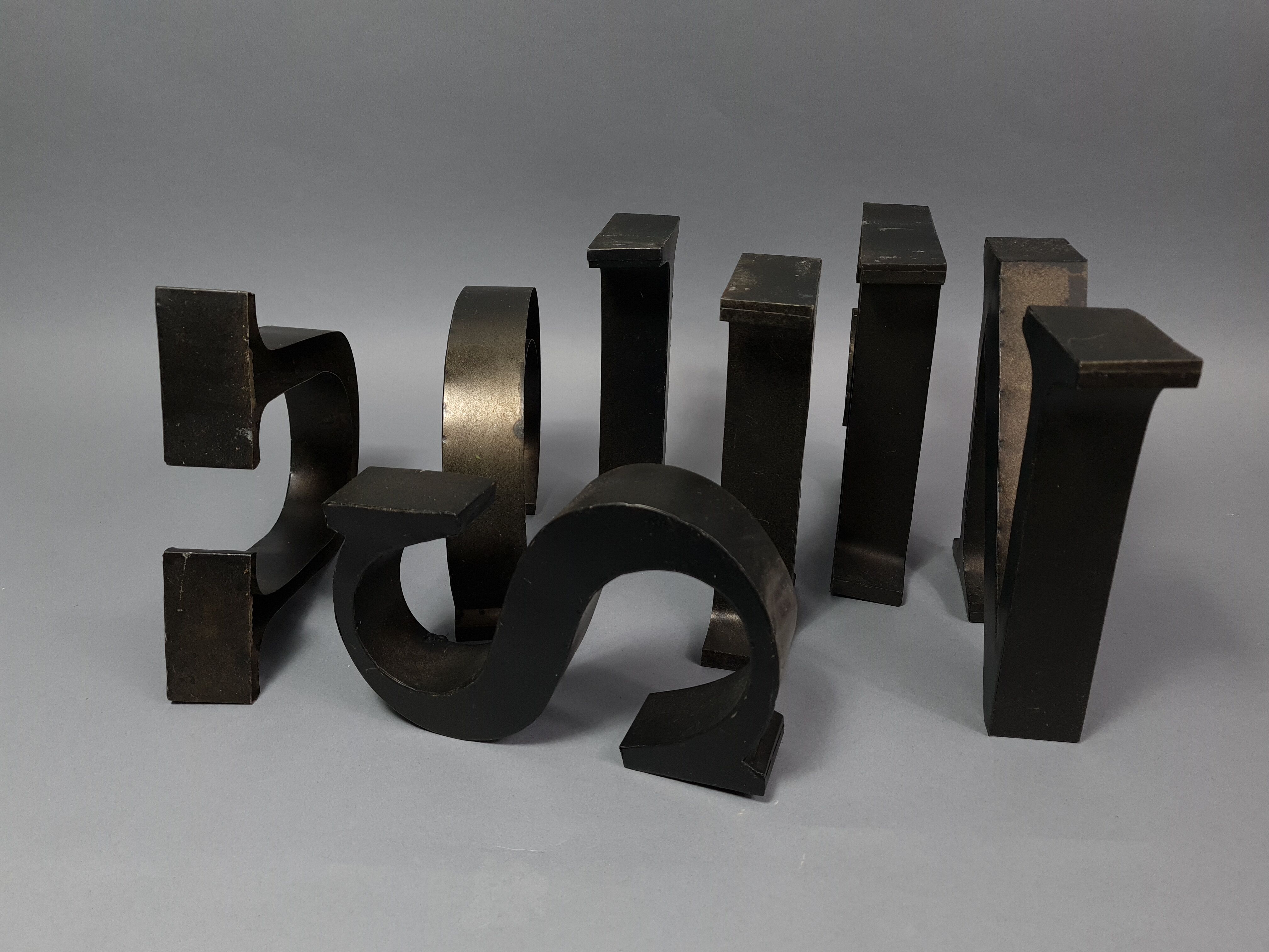 "kitchen" lettering set in blackened metal