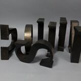 "kitchen" lettering set in blackened metal