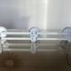 White lacquered metal wall coat rack with 3 hooks, 1980
