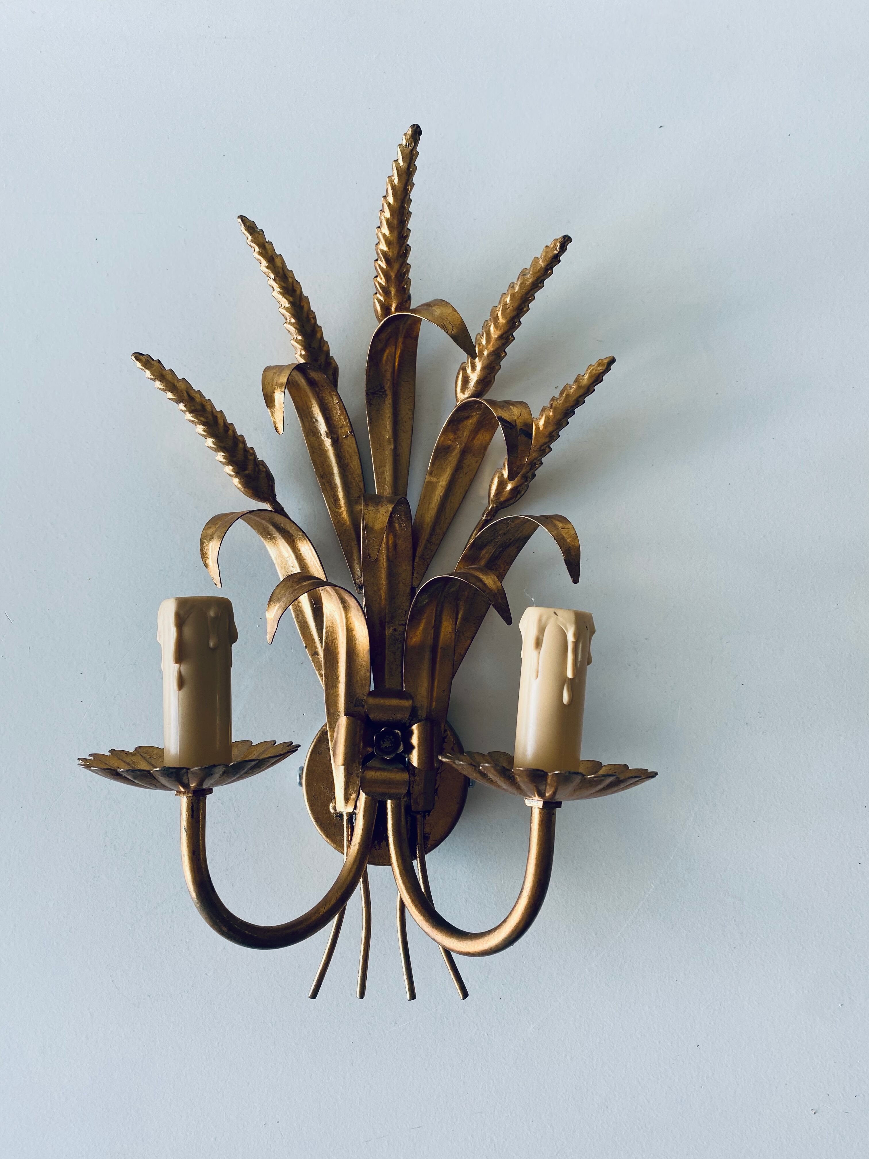 Double golden spike wall lamp