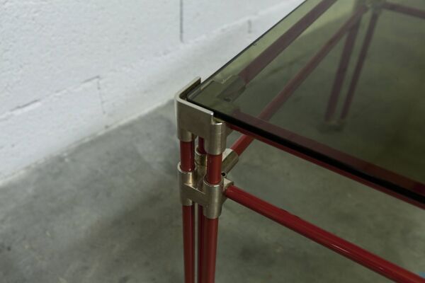 Table basse design italien postmodern en verre fumé structure acier rouge
