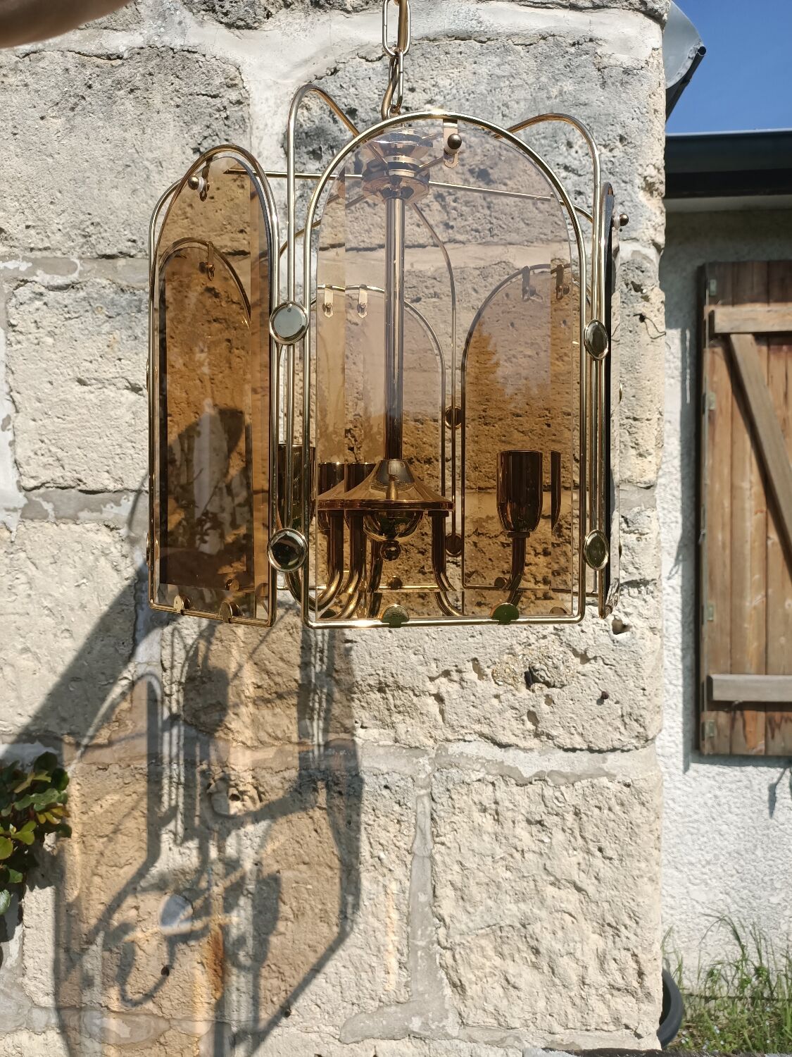 Gilded brass and smoked glass luminaire