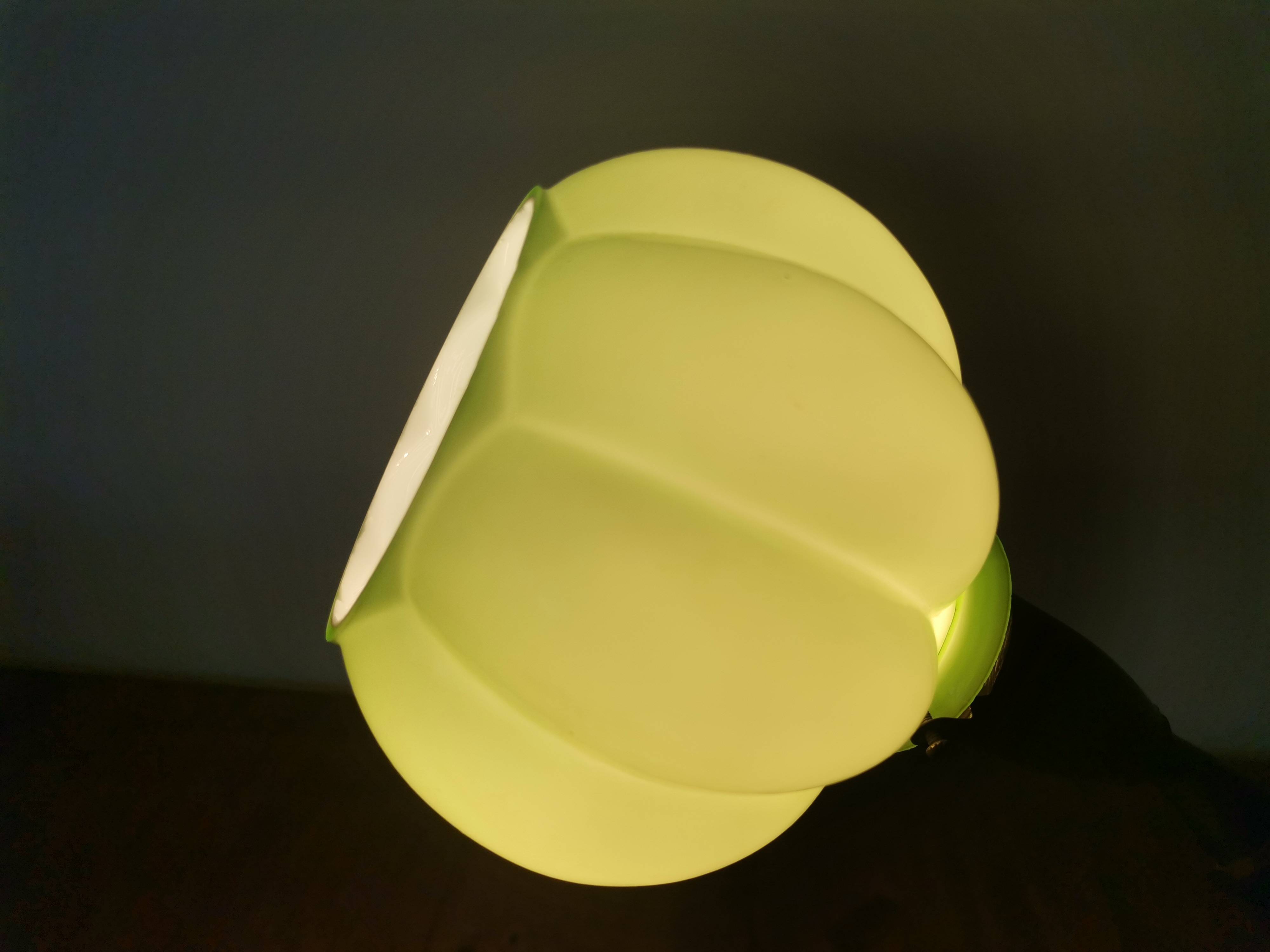 Modernist green cased glass and brass articulated table lamp