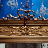 Louis XVI style gilded display case.