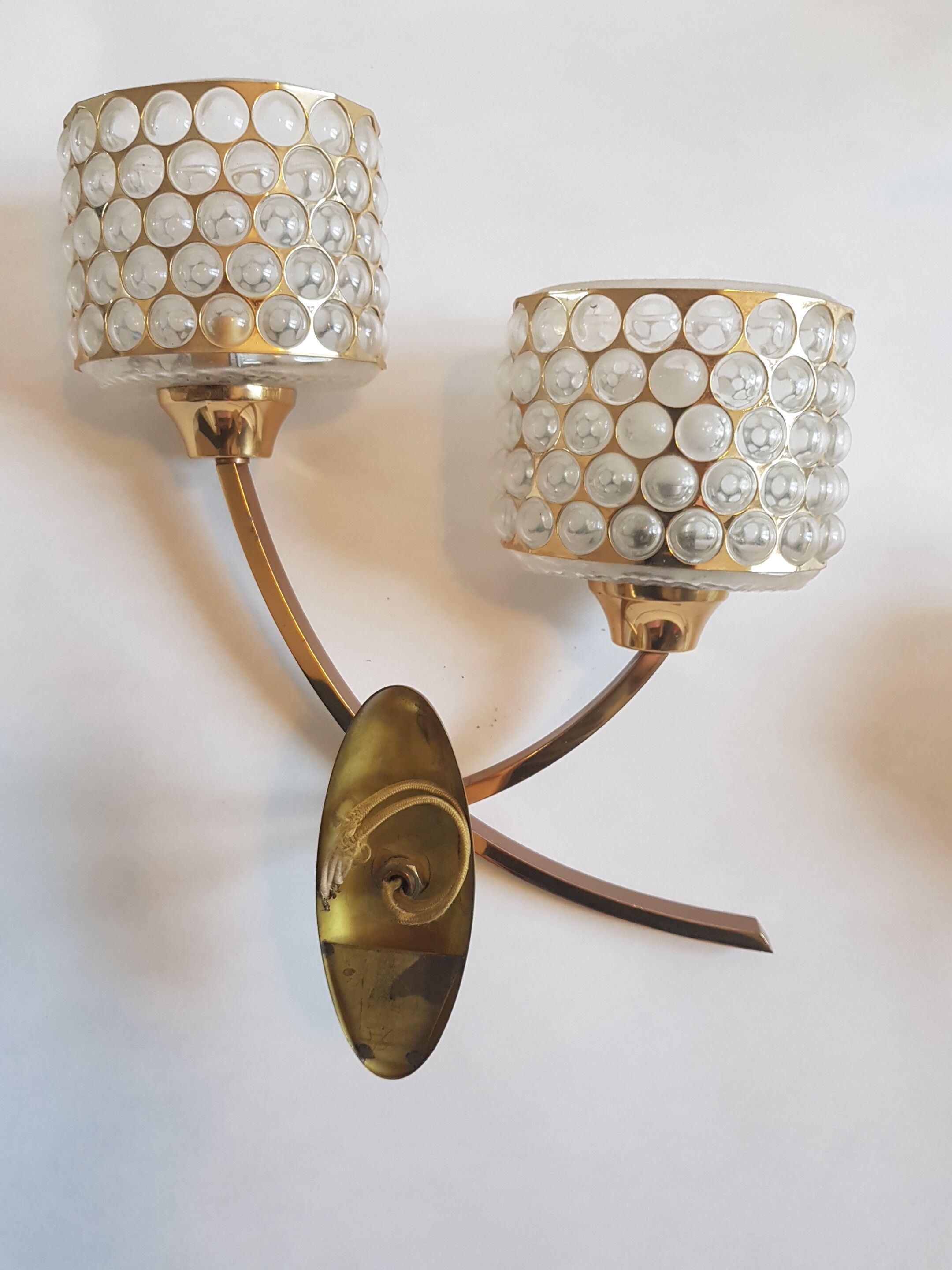 Three gold bronze sconces
