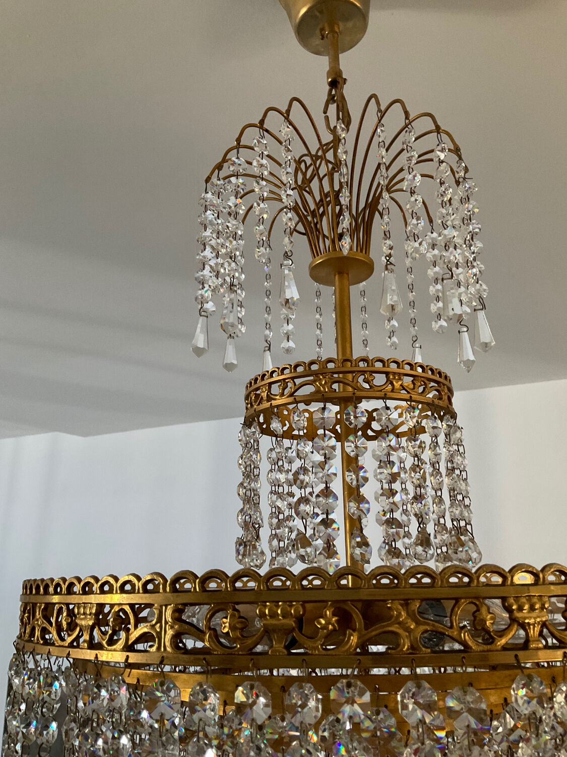 Cascade chandelier with crystal and bronze tassels