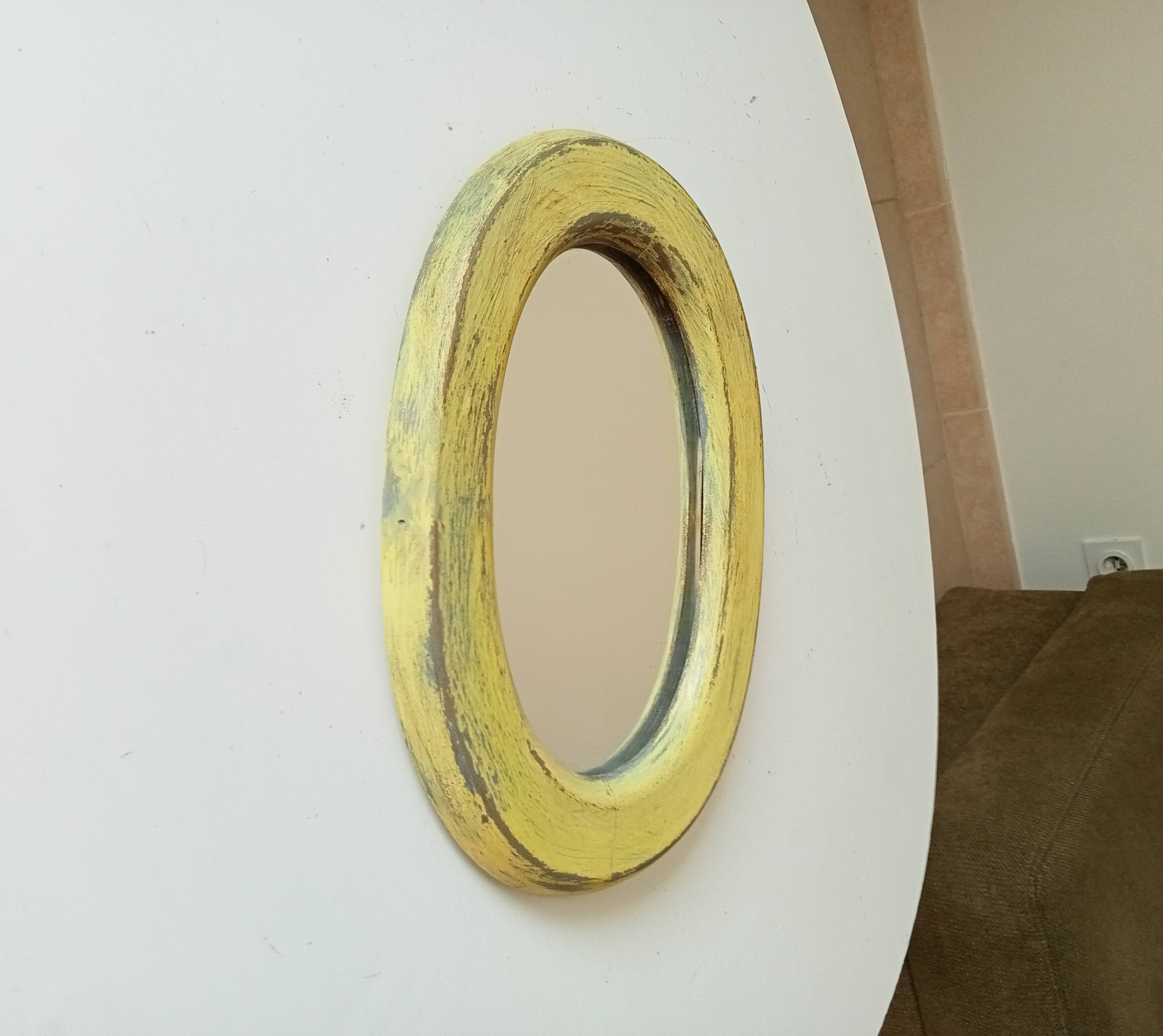 Small antique oval mirror