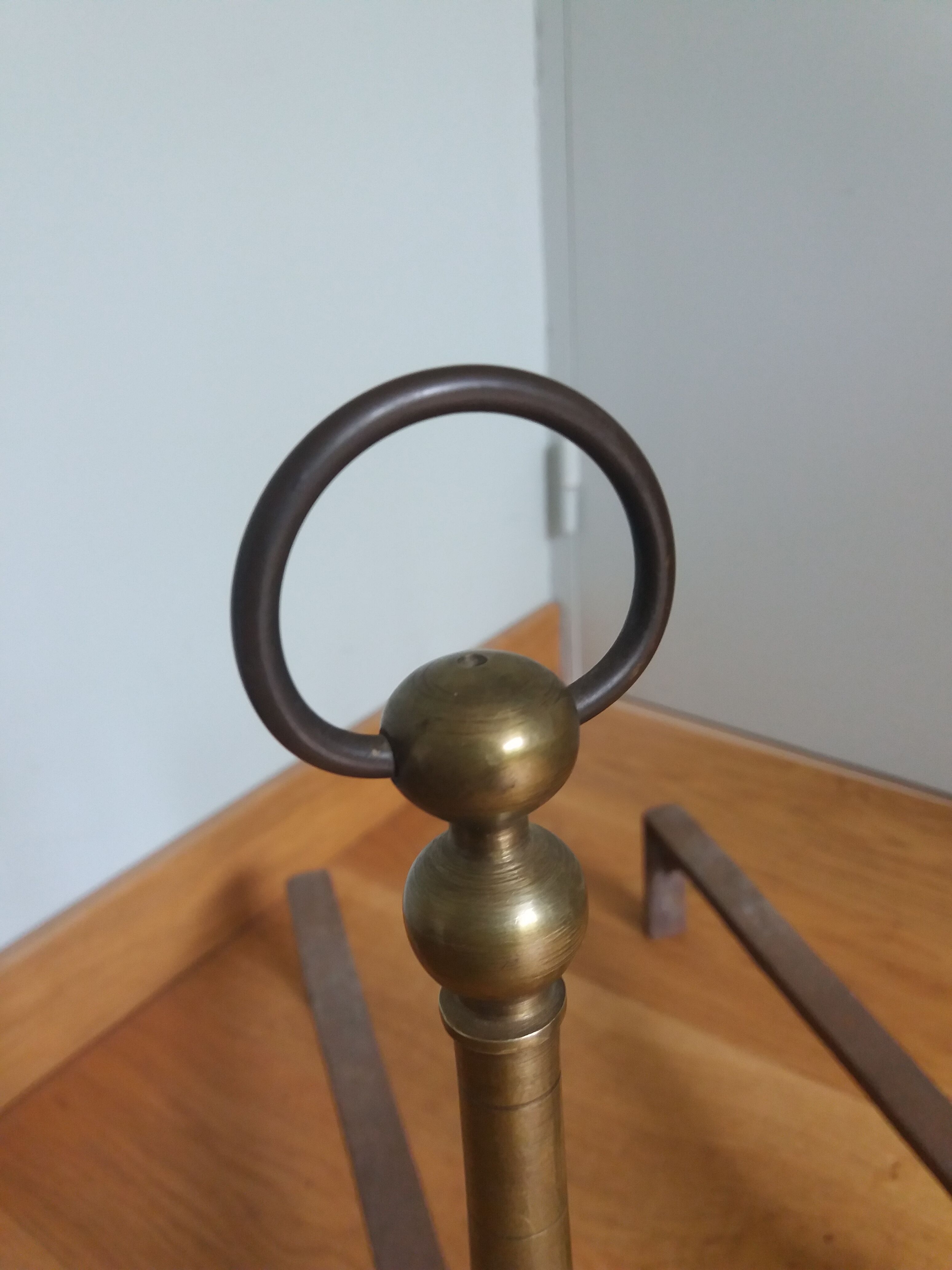 Brass or bronze andirons
