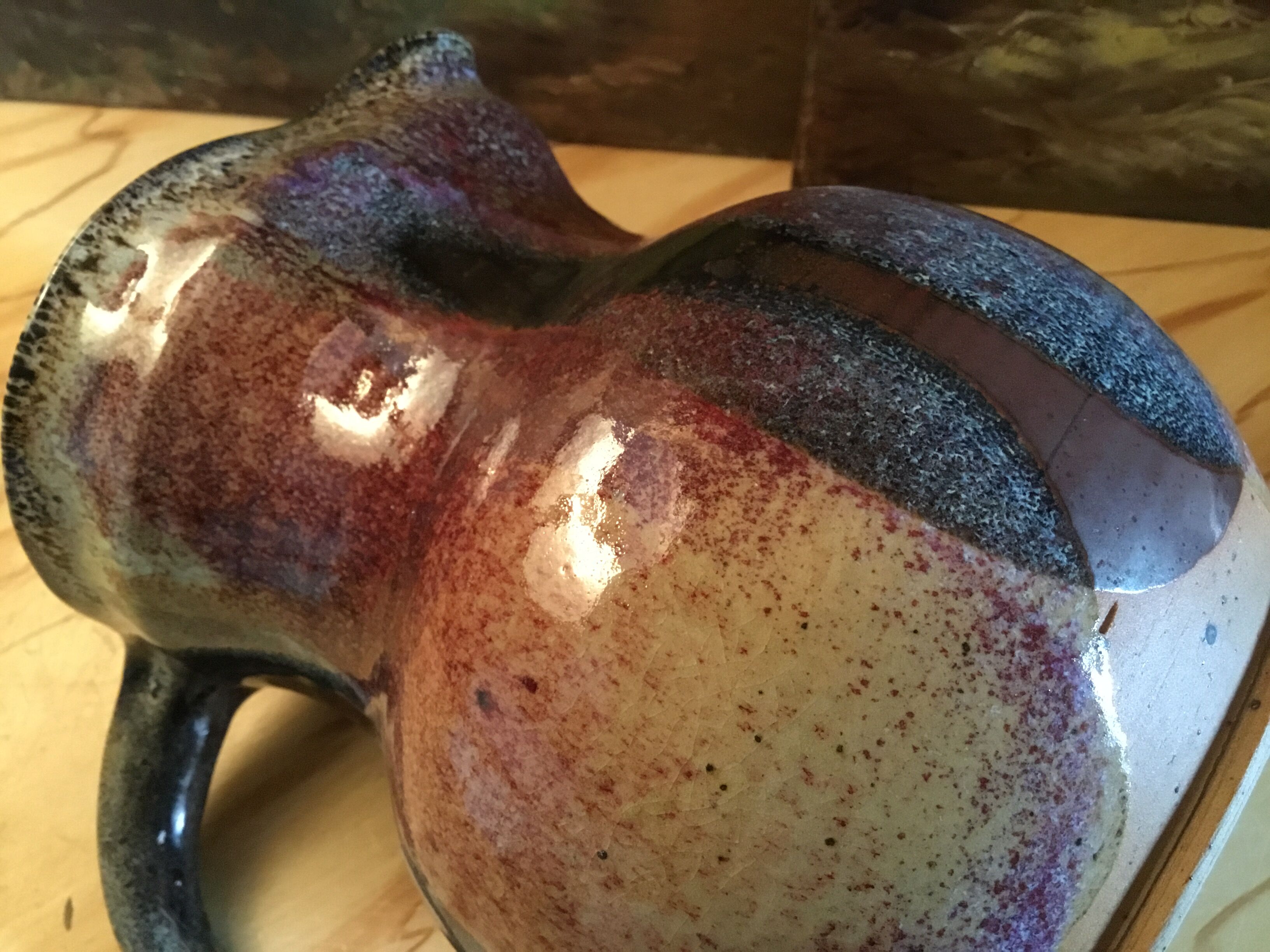 Signed varnished sandstone pitcher