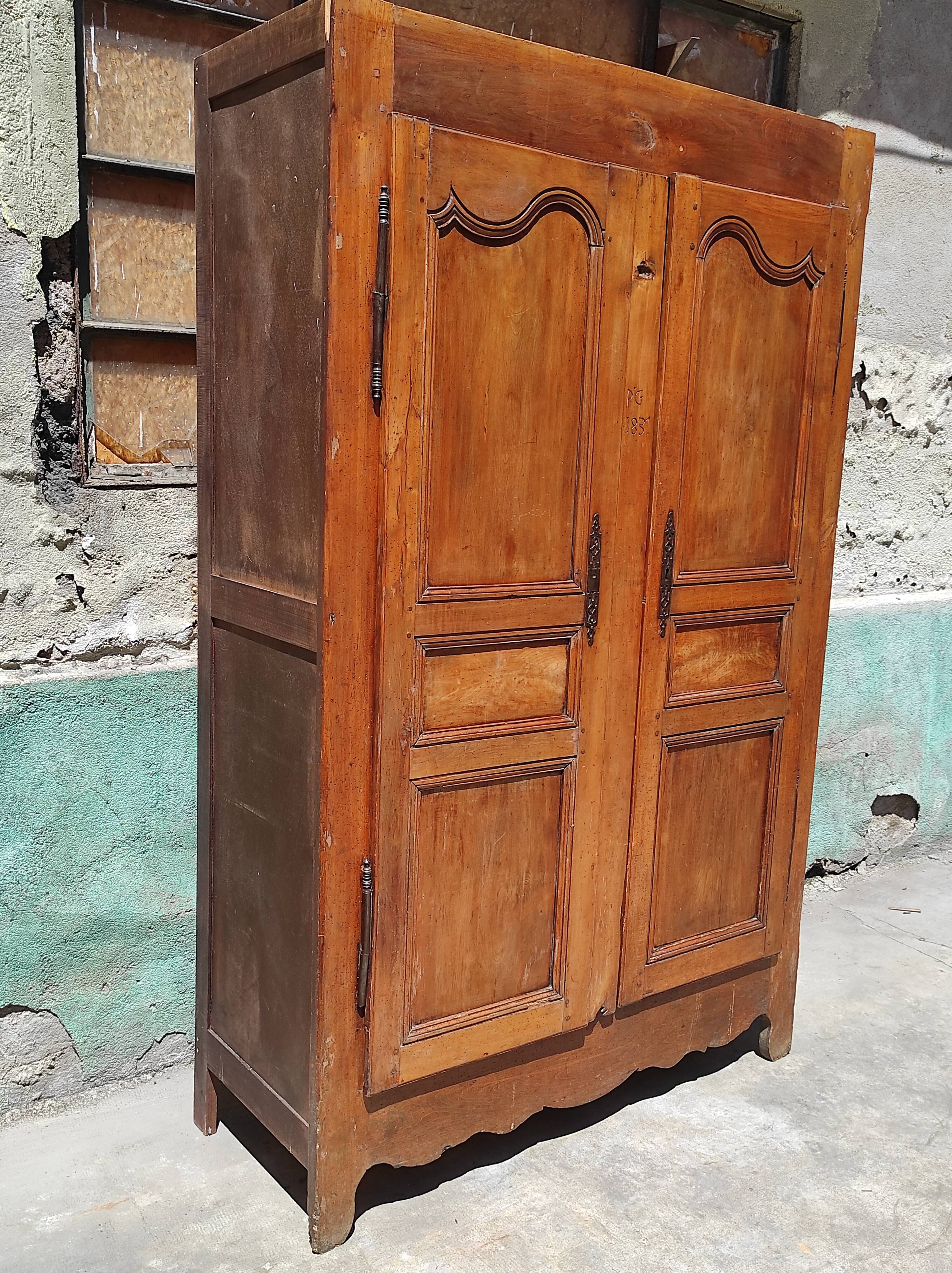 Old rustic oak cabinet of the 19th century louis 15 style