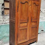 Old rustic oak cabinet of the 19th century louis 15 style
