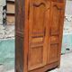 Old rustic oak cabinet of the 19th century louis 15 style
