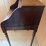 Pretty little secretary with a curtain.