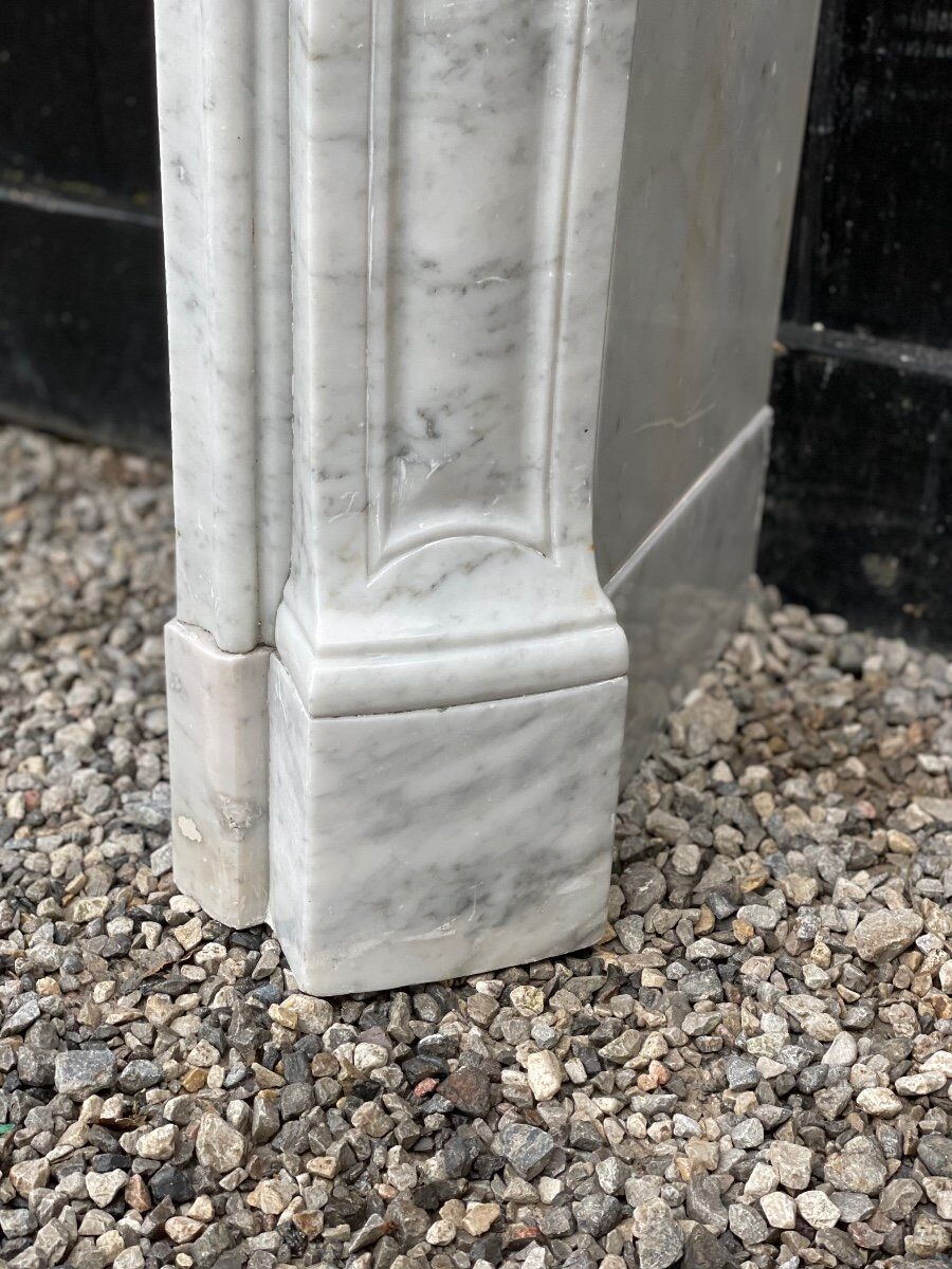 Louis XV style fireplace in Carrara marble
