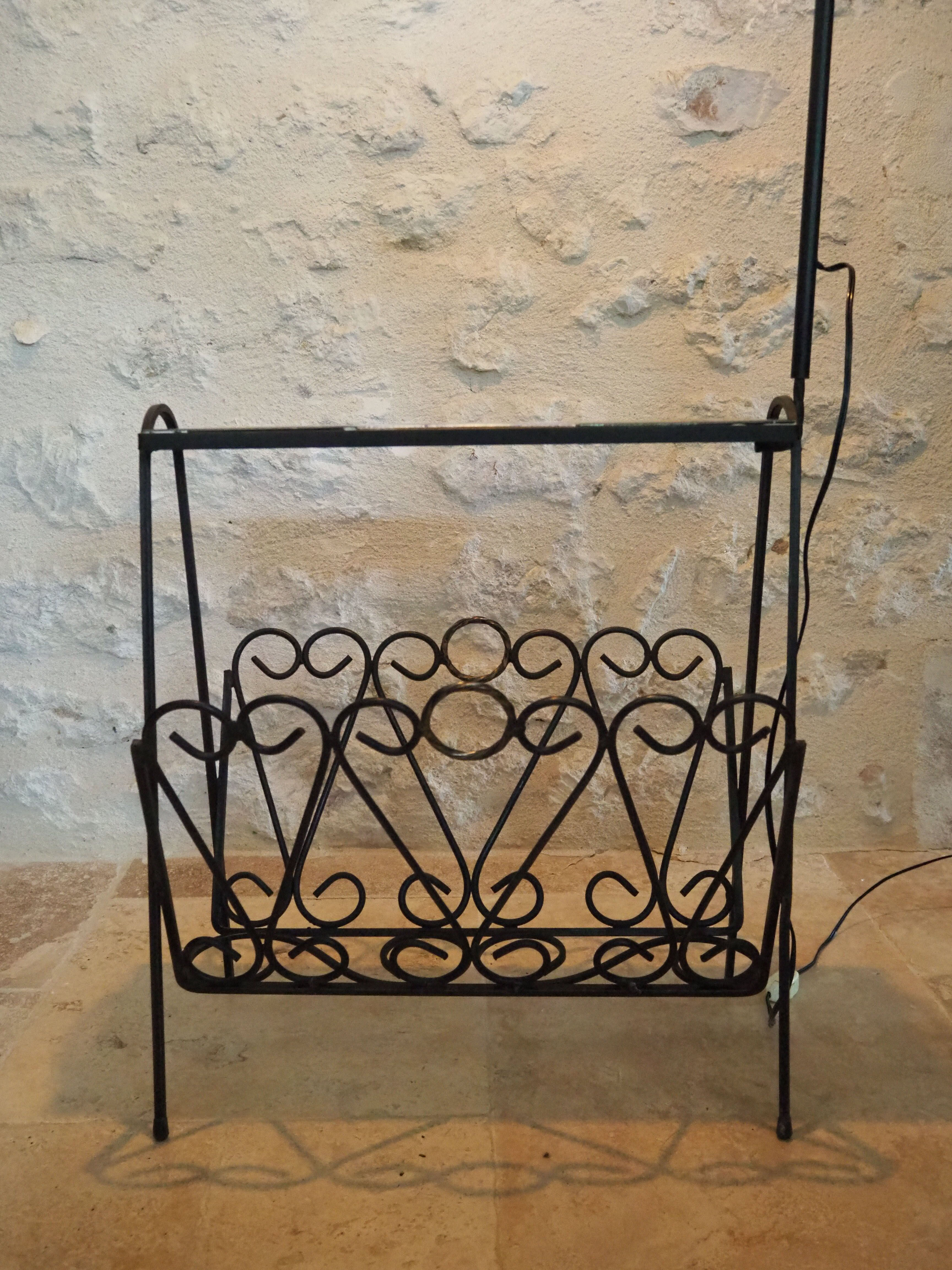 1970s black wrought iron ironing board with enamelled tiles