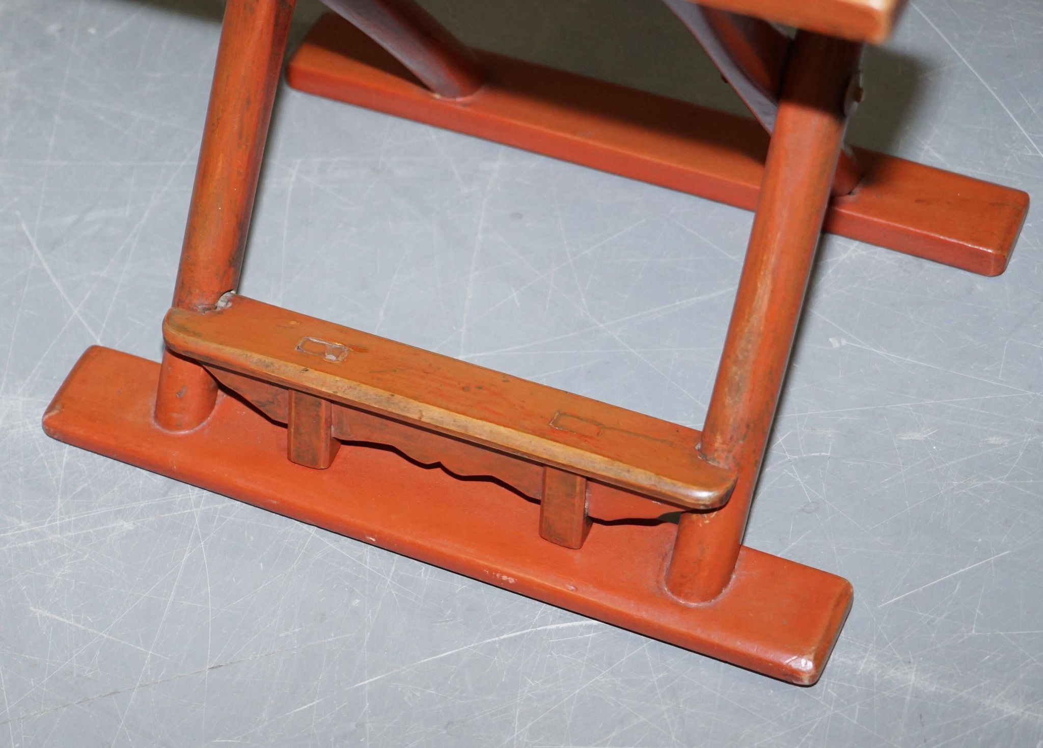 Antique Chinese folding chair with carvings, circa 1900-1920.