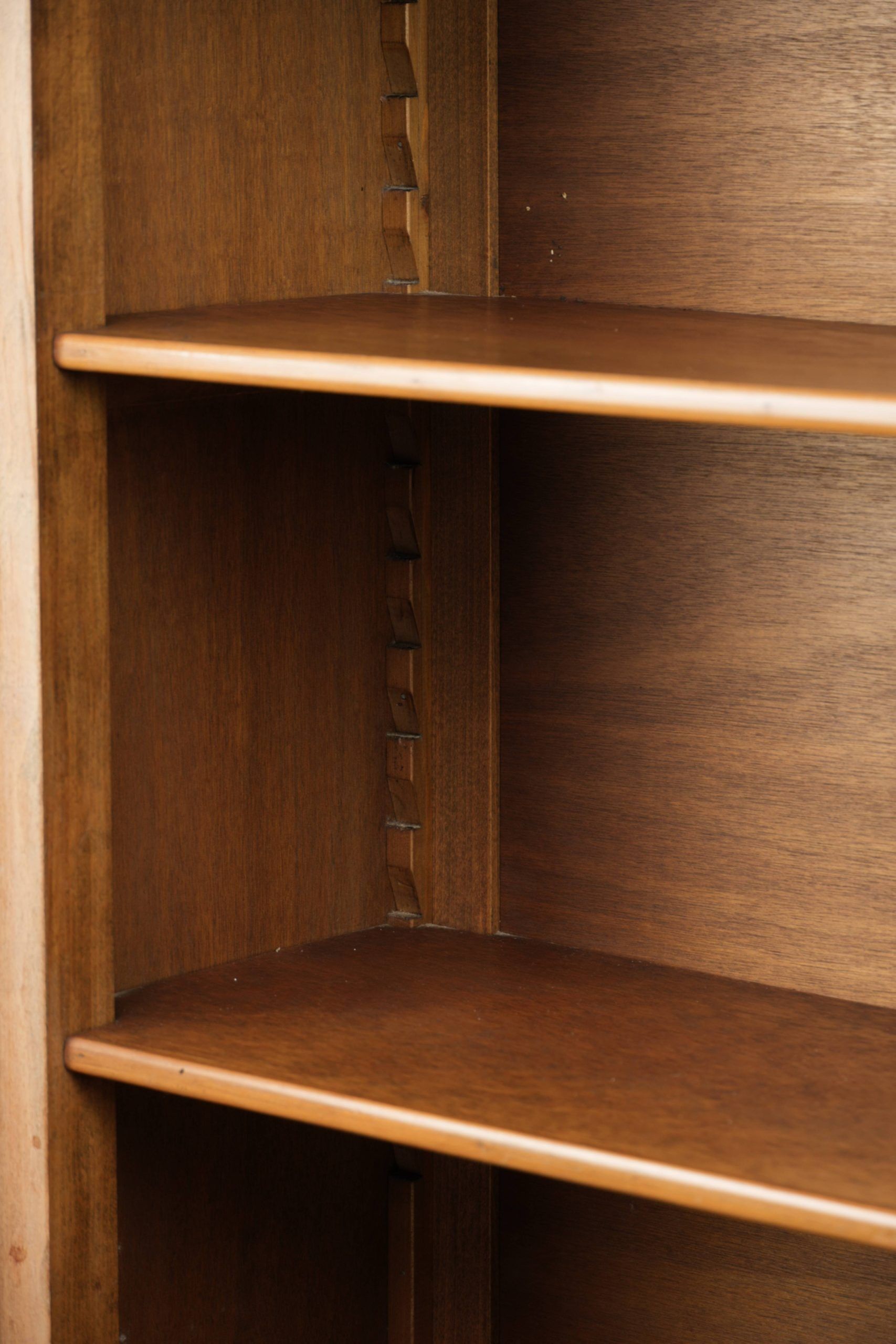 Subtle antique English bookcase/shelving unit from the late 19th century