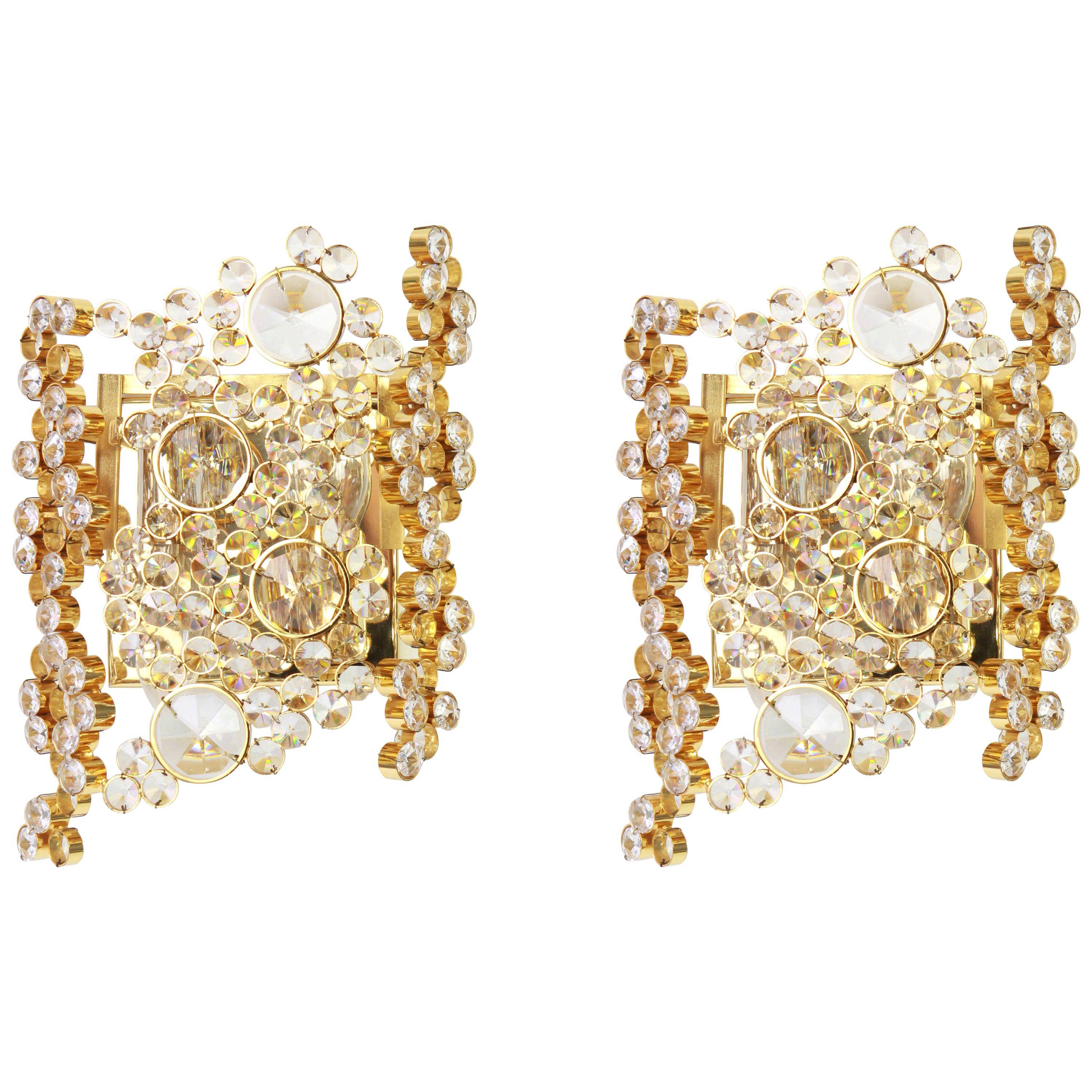 Pair of wall sconces in gilded brass and crystal by Palwa, Germany, 1960s.