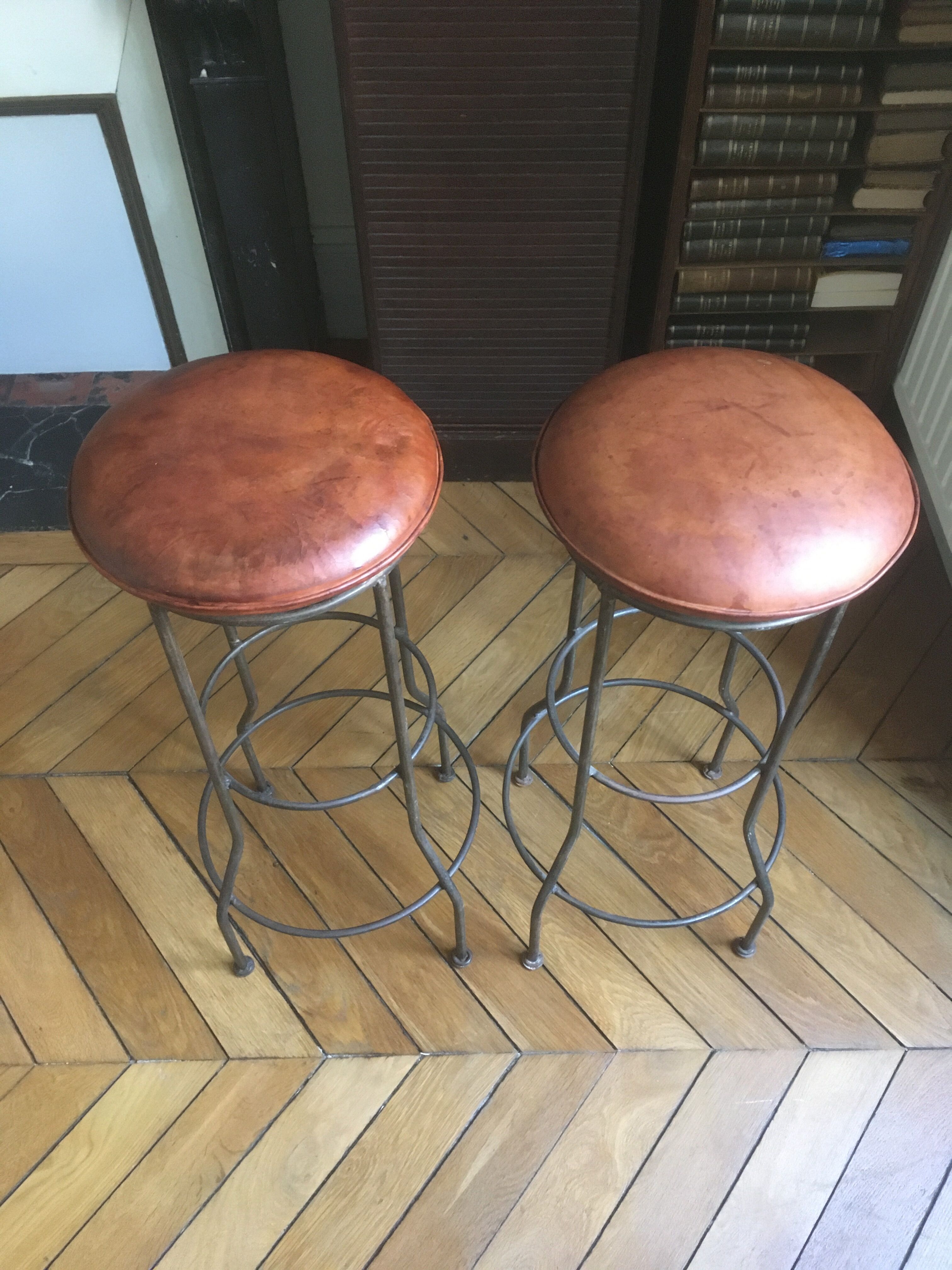Pair of leather seated bar stools