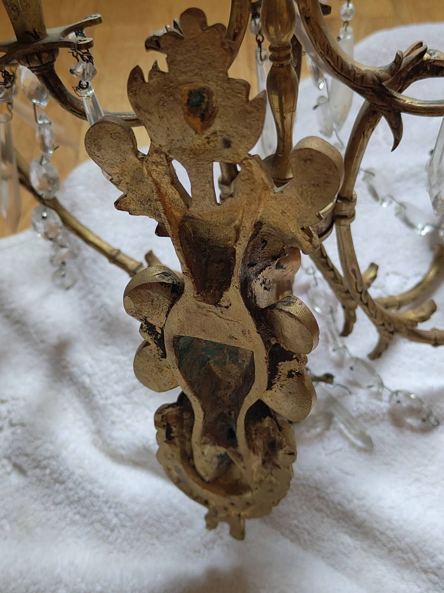 Gilded bronze wall lights with crystal pendants