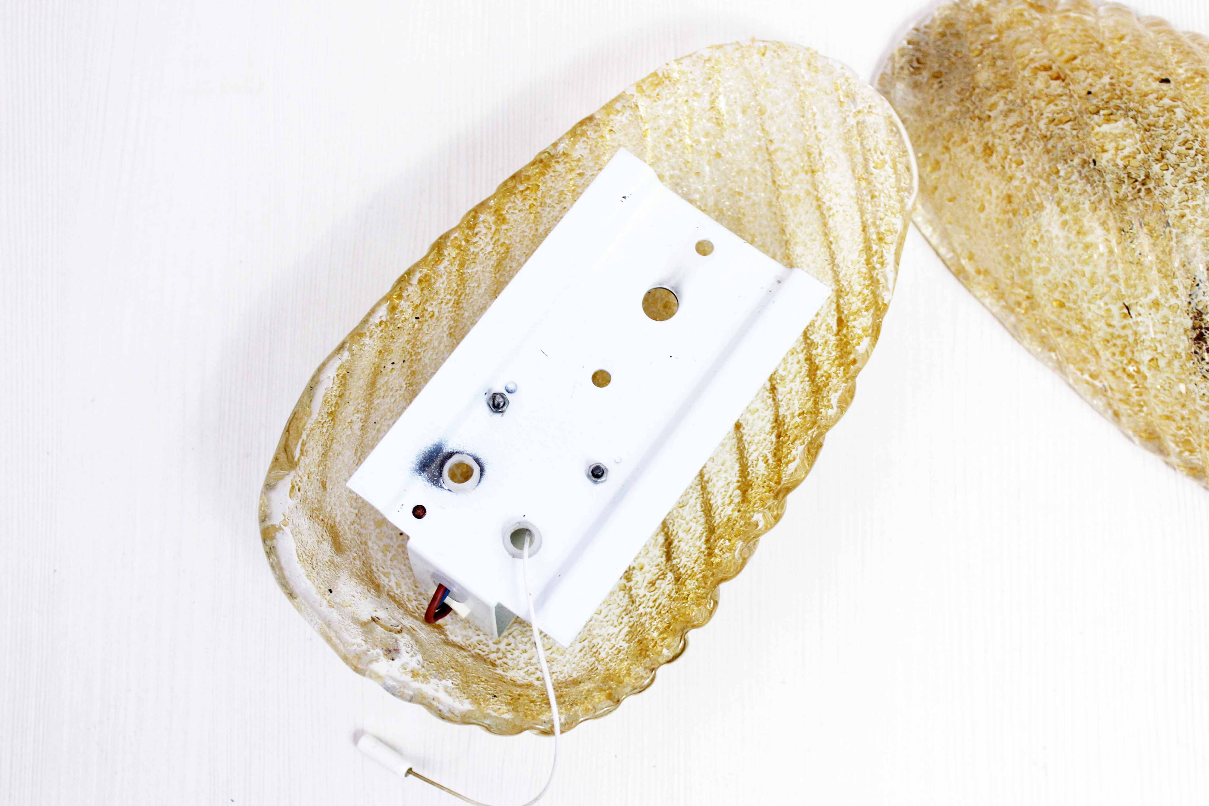 Pair of gilded glass wall lights 1970