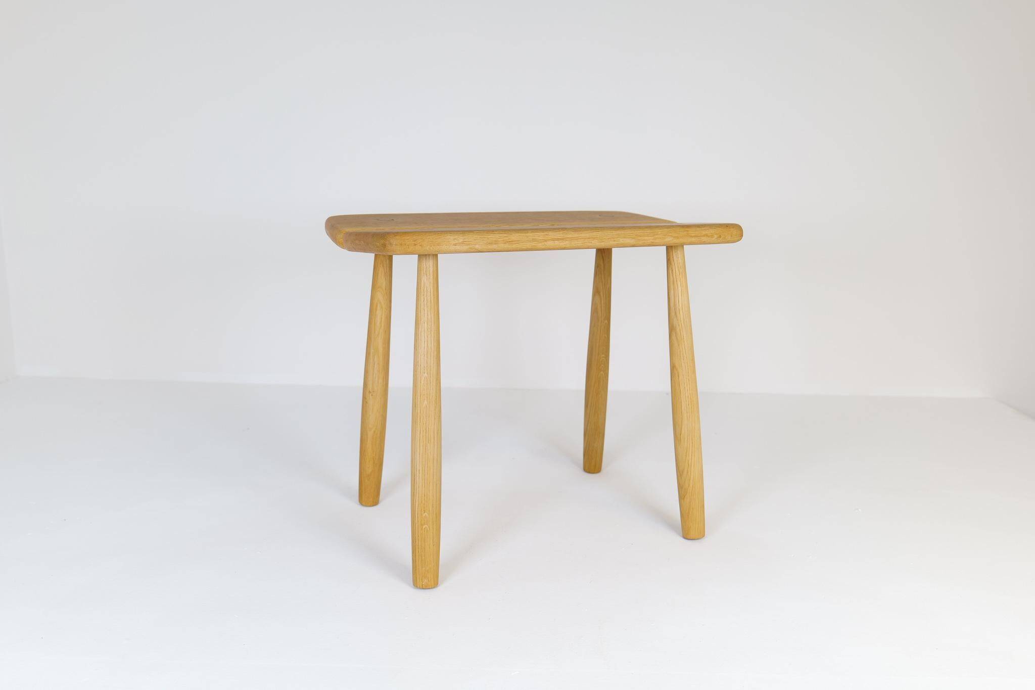 Sculptural mid-century stool in solid oak by Carl Gustaf Boulogner, Sweden, 1950s.