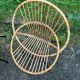 Fauteuil en rotin vintage pieds metal