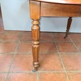 Round table 4 feet in cherry tree with 2 extensions