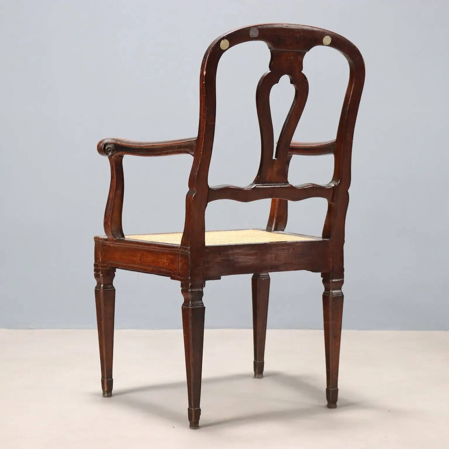Antique walnut armchair with caned seat, Italy, 18th century