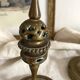 Pair of openwork brass candlesticks and glass bobeches