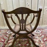 Fauteuil curule , assise cannée