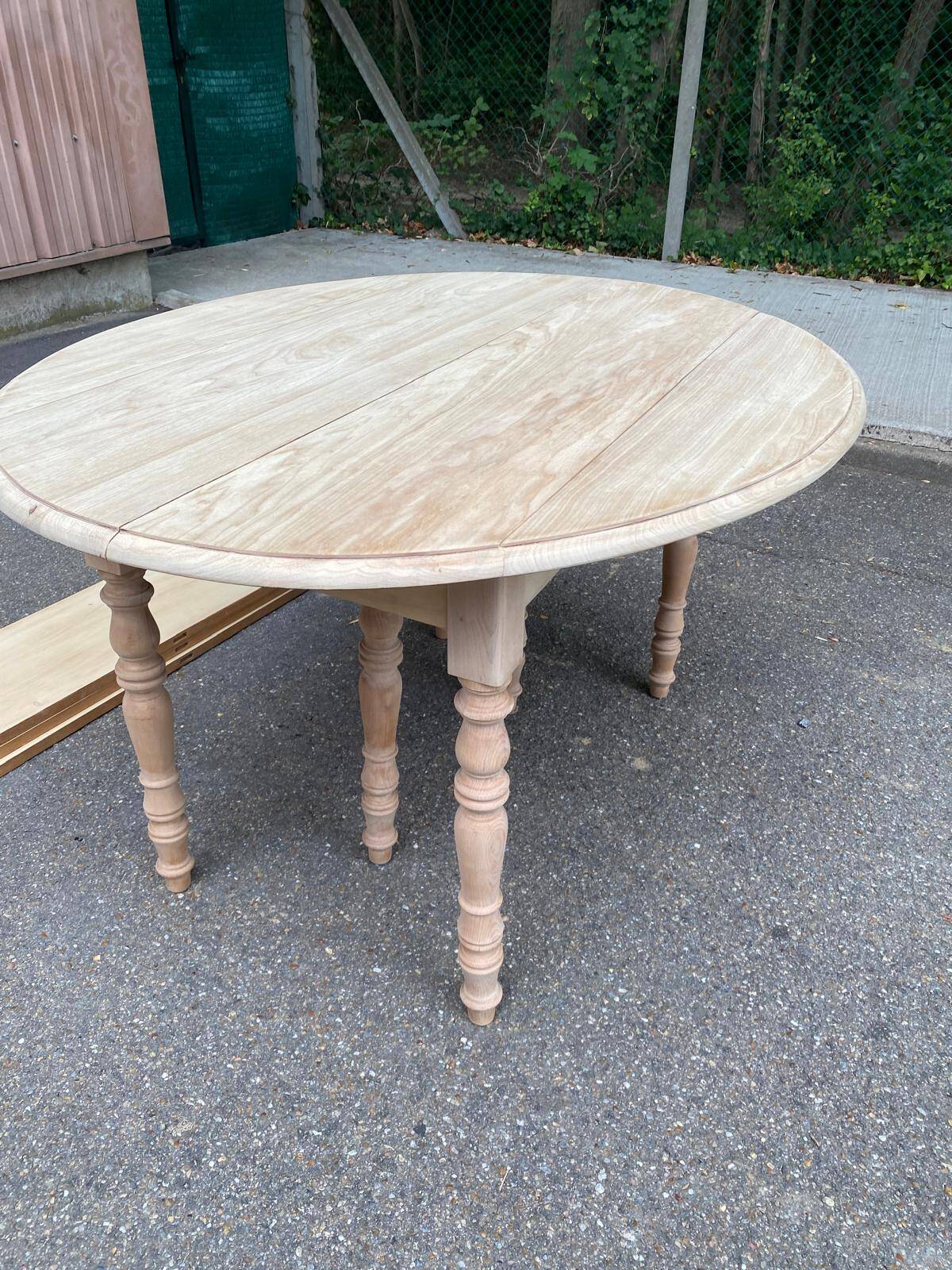 Renovated Louis Philippe round extendable dining table with flaps and 3 extensions.