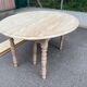 Renovated Louis Philippe round extendable dining table with flaps and 3 extensions.
