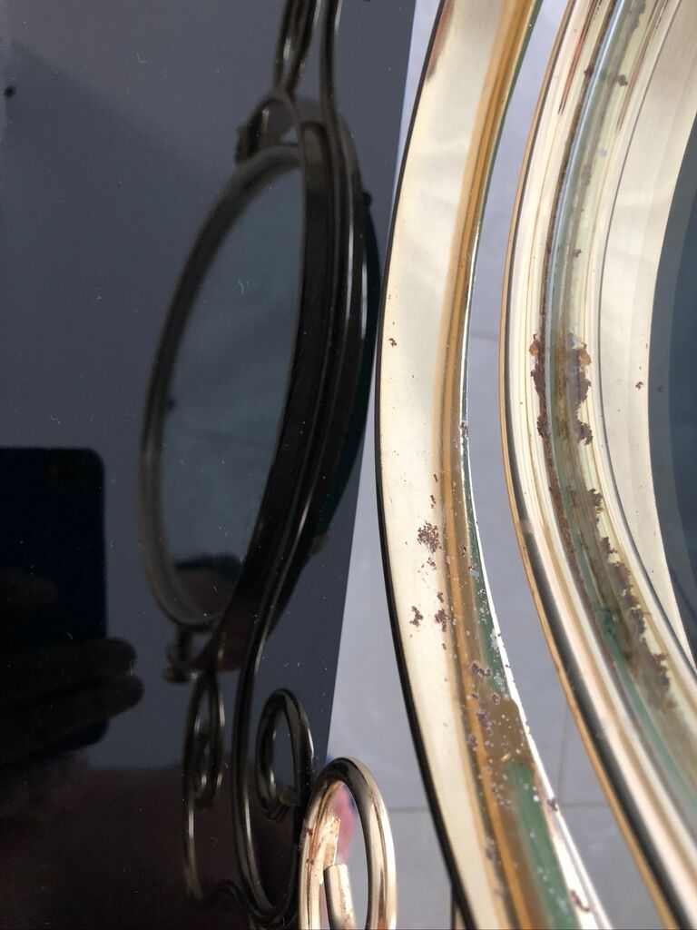 Brass hairdresser, glass and black plastic with its fluffy stool.