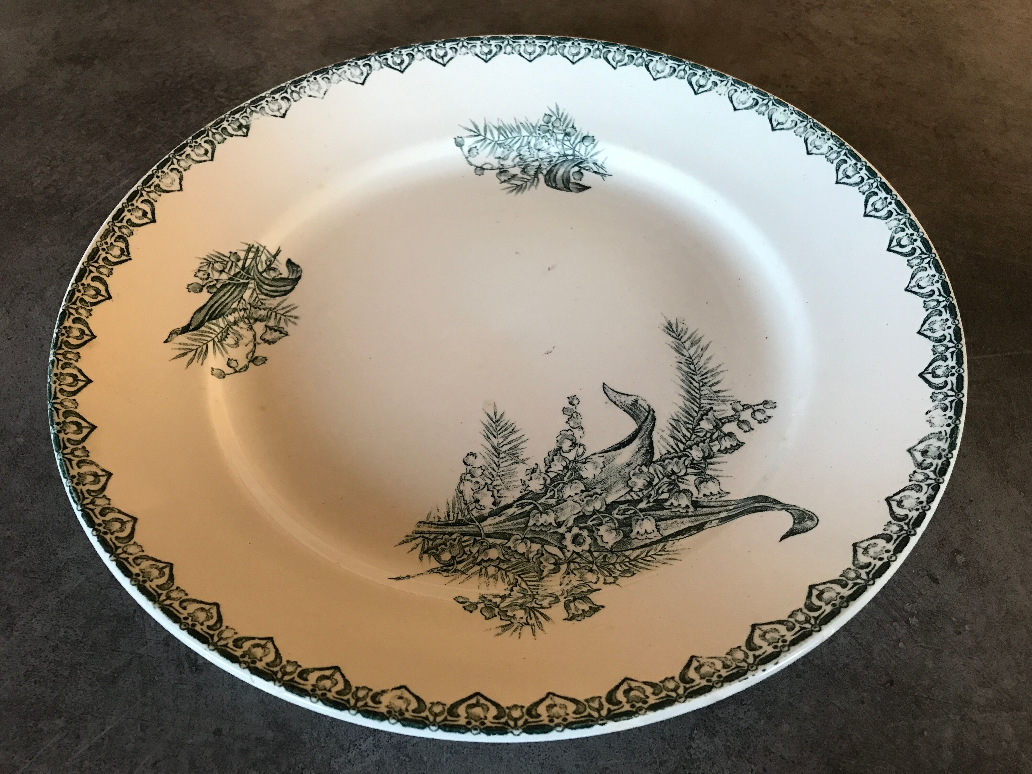 Flat hollow in earthenware st amandinoise st amand model lily of the valley