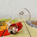 Ancienne carafe à liqueur en verre avec fleurs incrustées et dorures