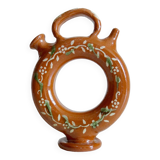 Circular glazed terracotta gargoulette