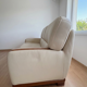 Beige leather sofa with solid wood frame